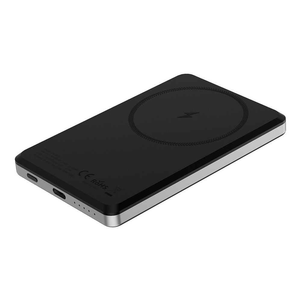 Zwarte TUNIQ powerbank liggend met ronde laadmarkering en zichtbare aansluitingen