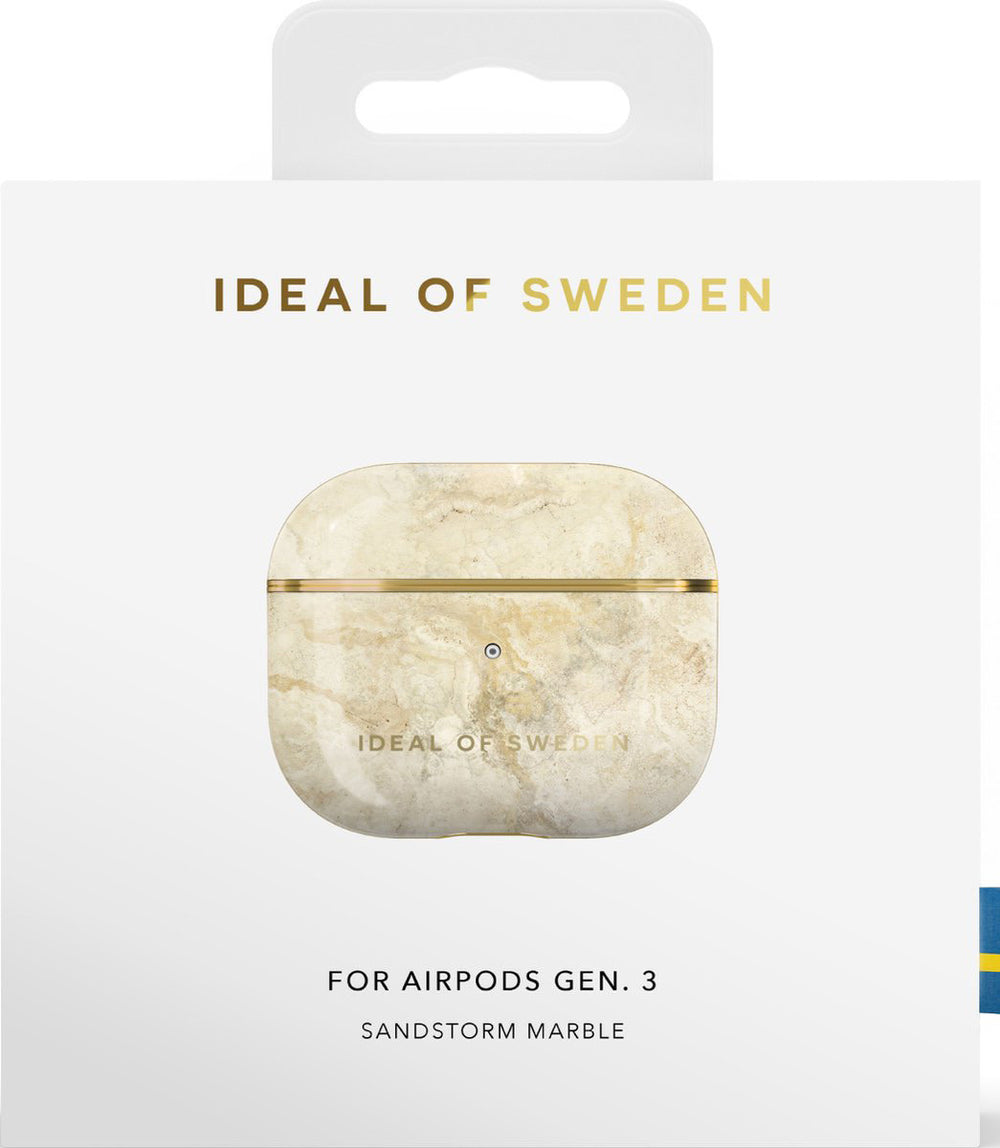 Verpakking van iDeal of Sweden AirPods-hoesje met beige marmerpatroon